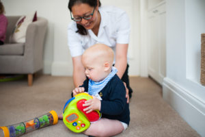 Hove Cranial Osteopath Aimee Cox treating baby